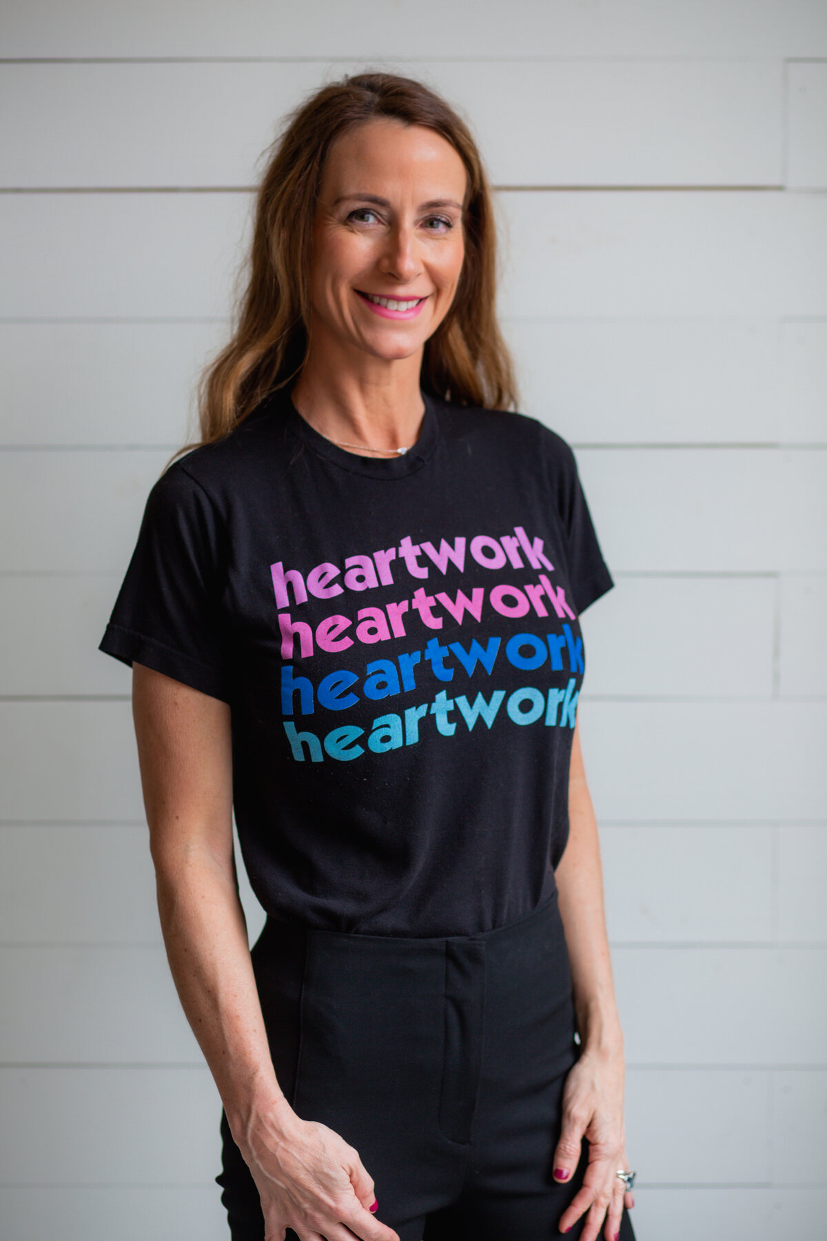 Tracey Abbott in a black heartwork t-shirt